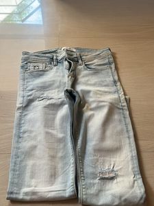 Light Wash Distressed Denim Jeans
