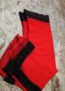 Elegant Red Saree with Black Embellished Border