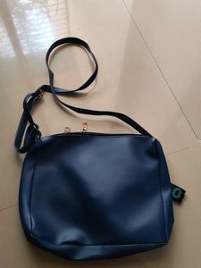 Stylish Blue Crossbody Bag with Pom-Pom