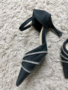 Elegant Black Heels with Rhinestone Embellishment