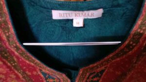 Green Kurta with Intricate Red Embroidery