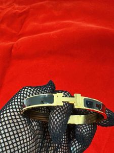 Gold &amp; Black H Bangle Bracelet