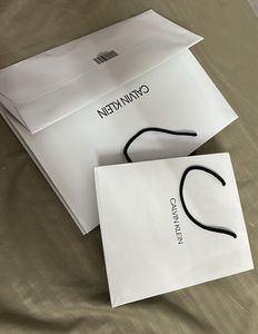 Calvin Klein paper shopping Bags (Small /large)