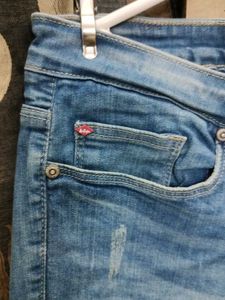 Light Blue Distressed Denim Jeans