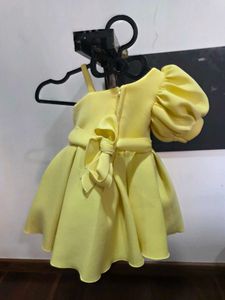 Cute Yellow Dress with Pink Flower Accent