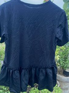 Chic Black Ruffled Hem Top