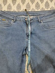 Distressed Blue Narrow Jeans