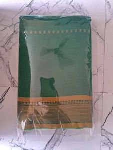 Elegant Green Saree with Gold Border