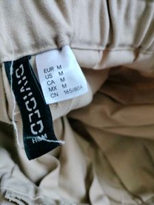 H&amp;M Pleated Beige Miniskirt
