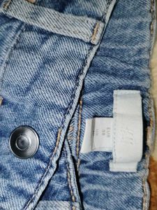 Ripped Blue Denim Jeans