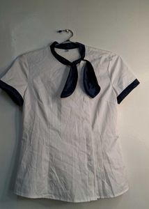 Professional White Blouse with Navy Necktie Trim
