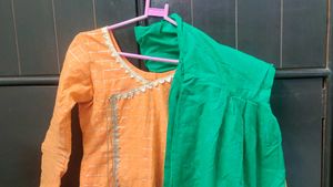 Orange kurta with golden border nakki lace