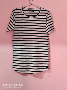 We Are Selling A Black & White Striped Tshirt 👕