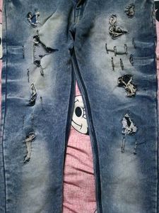 Distressed Blue Denim Jeans