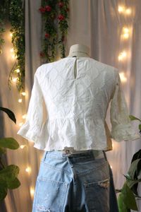 White Embroidered Peplum Top