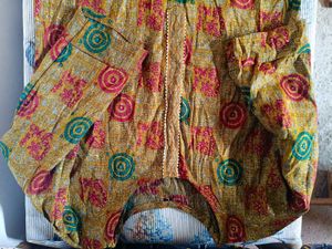 Yellow Printed Kurta with Black Pants