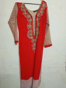 Elegant Red Kurta with Intricate Embellishments