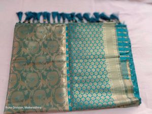 Elegant Teal and Gold Brocade Saree