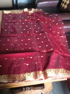 Elegant Maroon Saree with Gold Embellishments