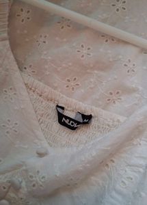 white cotton puff sleeved dress