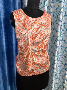 Stylish Orange & White Print Sleeveless Top