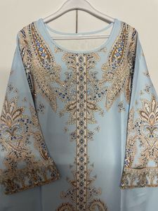 sky blue Chinese attire