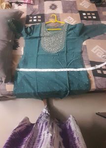 Teal Kurta with Intricate Neck Embroidery and mela