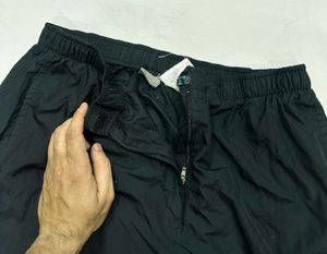 Nike Black Windbreaker Track Pants | Zip Ankle |