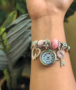 Charming Rose Gold Charm Bracelet Watch