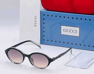 Gucci Oval Sunglasses