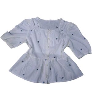 White Embroidered Peplum Top