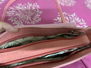 Chic Coral Crossbody Bag with Gold Chain Detail
