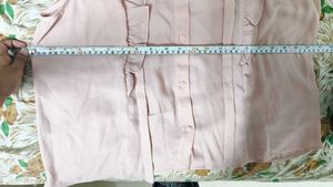 Chic Pink Ruffled Sleeveless Blouse