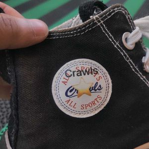 Converse High-Top Sneakers.