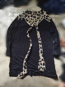 a black long-sleeved top or blouse