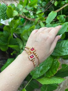 Elegant Gold Bangles with Red Stones