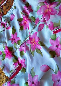 Elegant Floral Kurta with Statement Jewelry