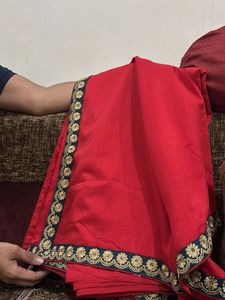 Elegant Red Saree with Floral Border