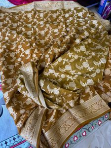 Elegant Brown Saree with Intricate Motifs