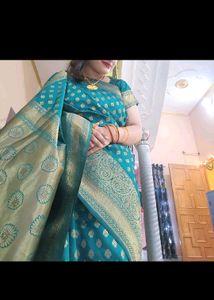 Elegant Teal Silk Saree with Gold Border