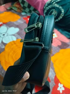 Unisex Sling Bag At Good Condition Black Colour