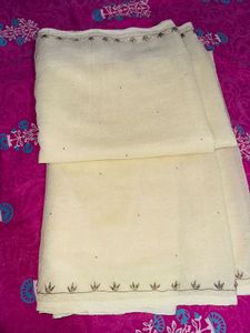 90s Shimmer Cream Saree with Intricate Border