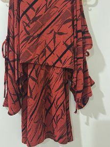 Rust cold shoulder pattern top