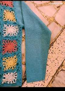 27. Crocheted Granny Square Sweater