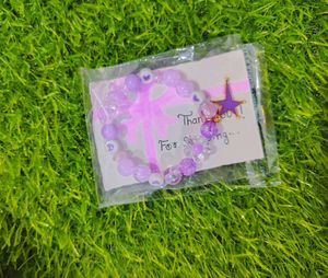 Purple Beaded Bracelet with Star Charm
