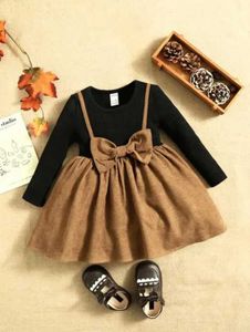 Cute Black & Brown Bow Dress. every size available