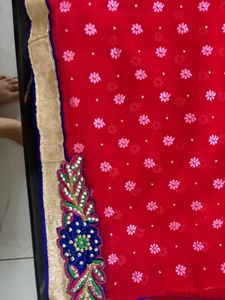 Vibrant Red Saree with Floral Embroidery