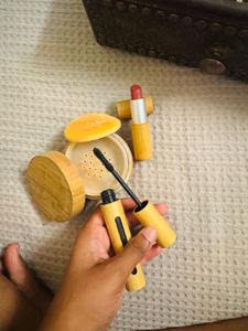 wooden makeup kit ..lip stick , mascara , foundati