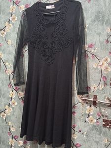 Elegant Black Dress with Lace Detail