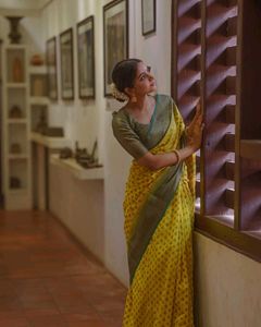 Vibrant Yellow Saree with Paisley Border